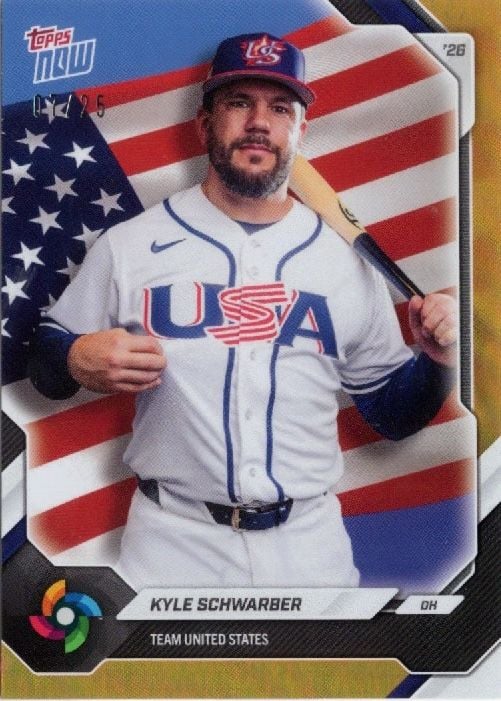 Kyle Schwarber in white USA jersey holding baseball bat against American flag background on trading card.
