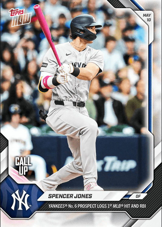 Spencer Jones in batting stance wearing gray Yankees uniform holding pink bat during game, Topps Now card front.