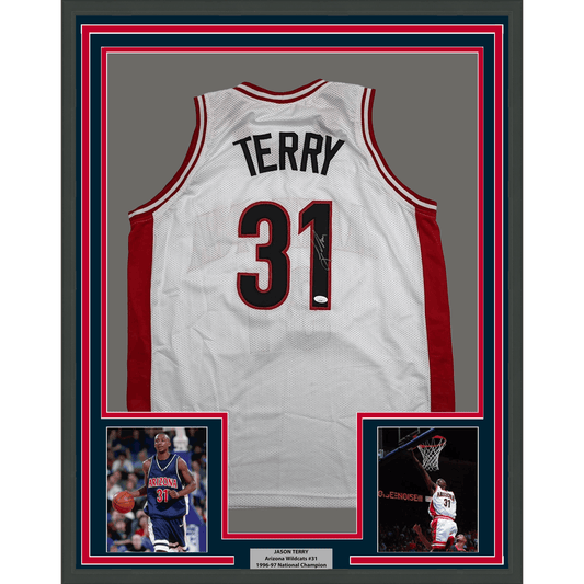 Signed white Arizona Wildcats #31 basketball jersey displayed in frame with accompanying photos and nameplate.