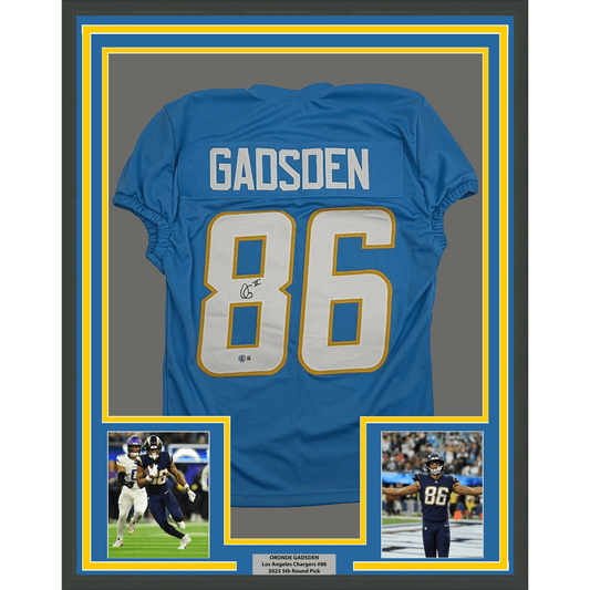 Framed blue Los Angeles Chargers jersey number 86 with "Gadsden" nameplate, signed, displayed with two action photographs and credential plaque.