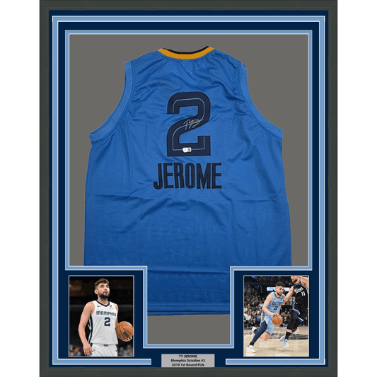 Back view of signed blue Memphis Grizzlies #2 Jerome basketball jersey in framed display with player photos.