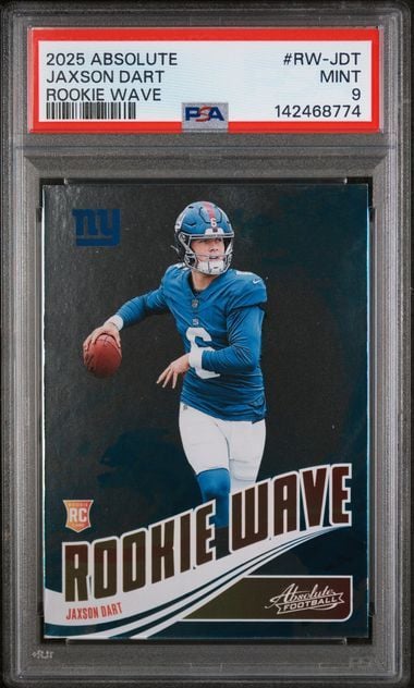 PSA-graded rookie football card in plastic case displaying Jaxson Dart in blue Giants uniform holding football, with red label at top.
