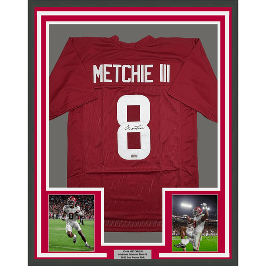 Framed crimson Alabama football jersey numbered 8 with "METCHIE III" nameplate, signed, displayed with two action photos and authentication plaque.