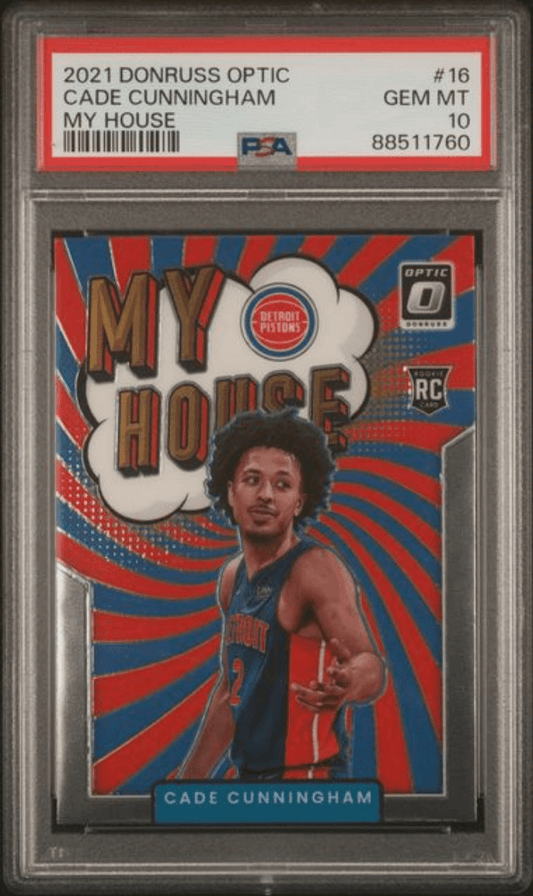 PSA graded 10 rookie card of Cade Cunningham in Detroit Pistons uniform with "My House" design and red-blue striped background.