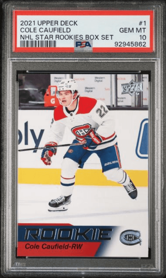 Front of graded hockey card showing Cole Caufield in Montreal Canadiens uniform with PSA 10 Gem Mint grade label visible on gray holder.