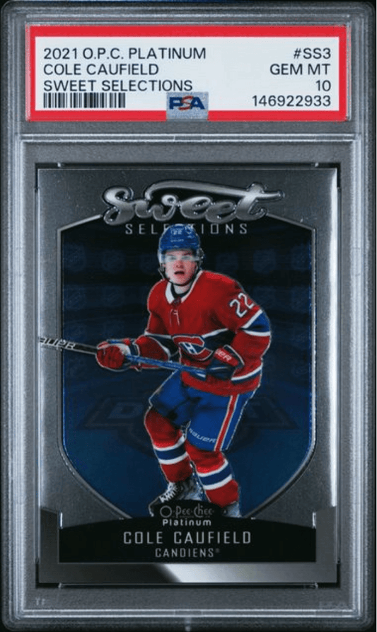 Front of graded PSA 10 hockey card in clear plastic case showing Cole Caufield in red Montreal Canadiens uniform on dark blue background.