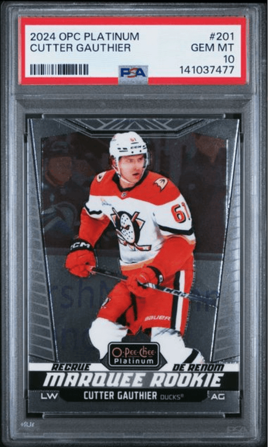 PSA-graded 2024 OPC Platinum Cutter Gauthier rookie hockey card in clear case displaying player in red and white Ducks uniform.