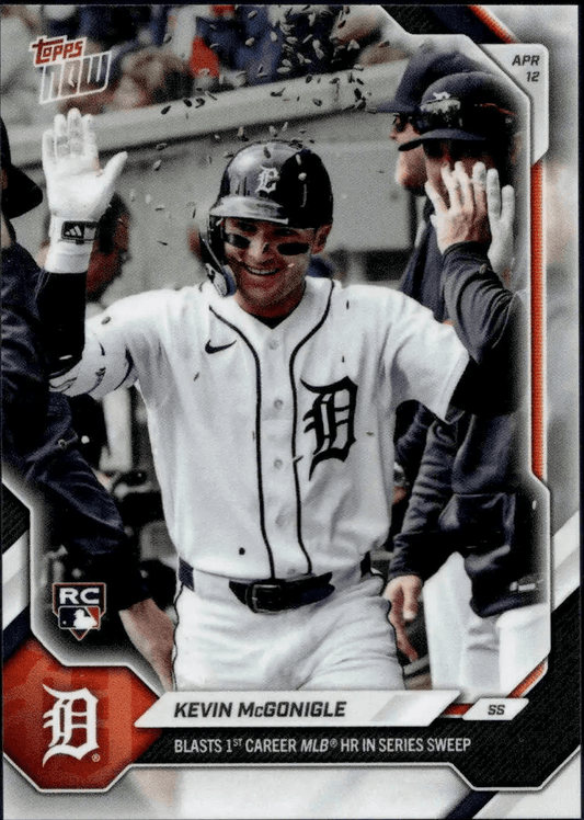 Kevin McGonigle in white Detroit Tigers uniform celebrating in dugout with teammates, Topps Now baseball card front showing RC logo and text.
