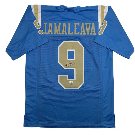 Blue UCLA college football jersey number 9 with "IAMALEAVA" across the chest and gold trim, displayed flat against white background.