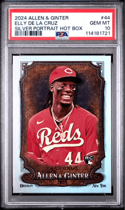 PSA-graded 2024 Allen & Ginter Elly De La Cruz rookie card in clear case showing smiling player in red Reds uniform with #44.