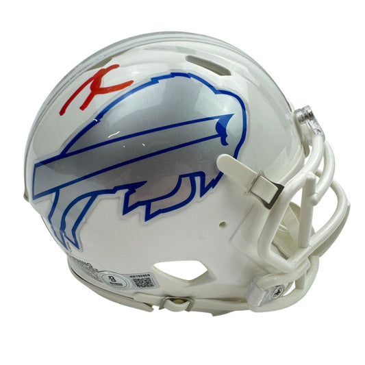 White Buffalo Bills mini helmet with blue logo and red autograph, shown from the side angle.