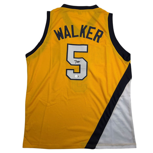 Back view of yellow basketball jersey with black and white trim displaying "WALKER" and number "5" with autograph.