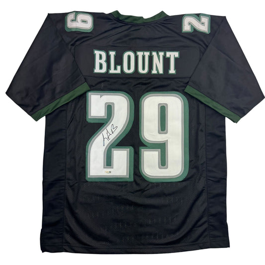 Back view of black Philadelphia Eagles football jersey number 29 with "BLOUNT" nameplate and autographed signature on white numeral.