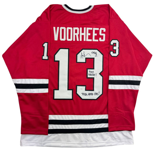 Red Voorhees hockey jersey with white number 13 and multiple autographed inscriptions visible on the chest, displayed flat against white background.