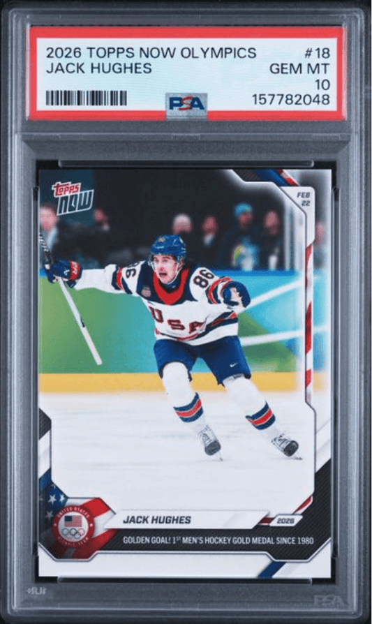 PSA-graded trading card in clear case showing Jack Hughes in USA Olympic hockey jersey celebrating with raised stick on ice.