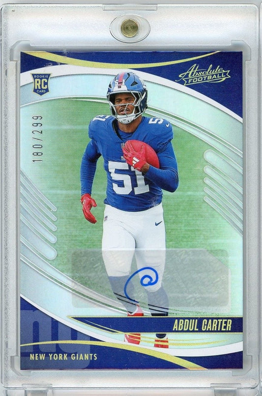 Front of graded 2025 Panini Absolute Abdul Carter rookie card showing player in New York Giants blue uniform with autograph and serial number 180/299.