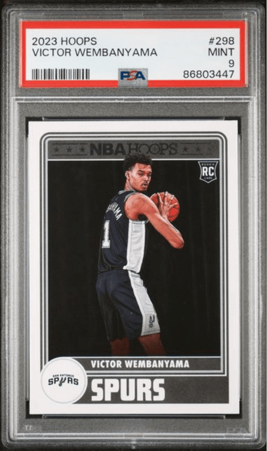 PSA-graded 2023 Hoops Victor Wembanyama rookie card #298 in protective case showing front with player in Spurs uniform.