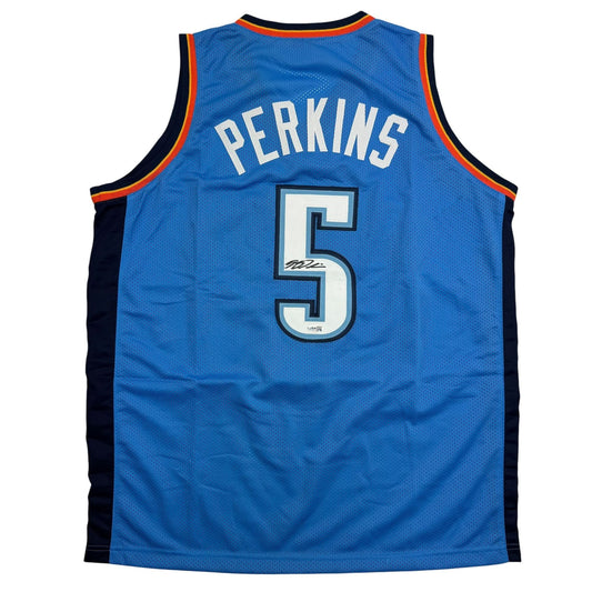 Back view of blue OKC Thunder basketball jersey with "PERKINS" and number 5 in white with autographed signature.