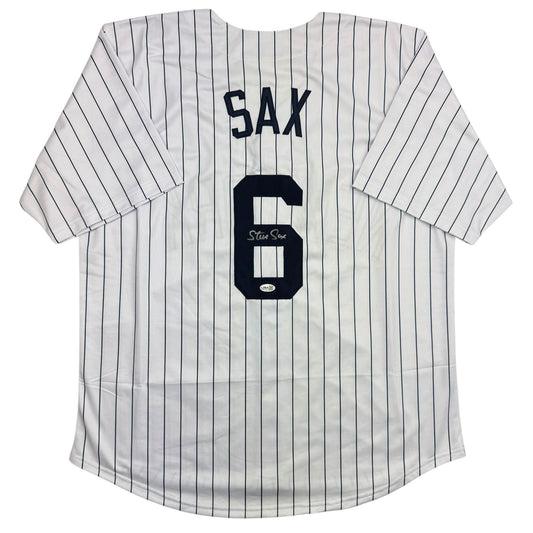 White pinstriped Chicago White Sox jersey number 6 with "SAX" across chest and autographed signature, front view.