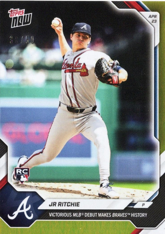 Baseball card showing JR Ritchie mid-pitch in Atlanta Braves uniform, gold foil numbered 31/50 with RC logo and debut text.