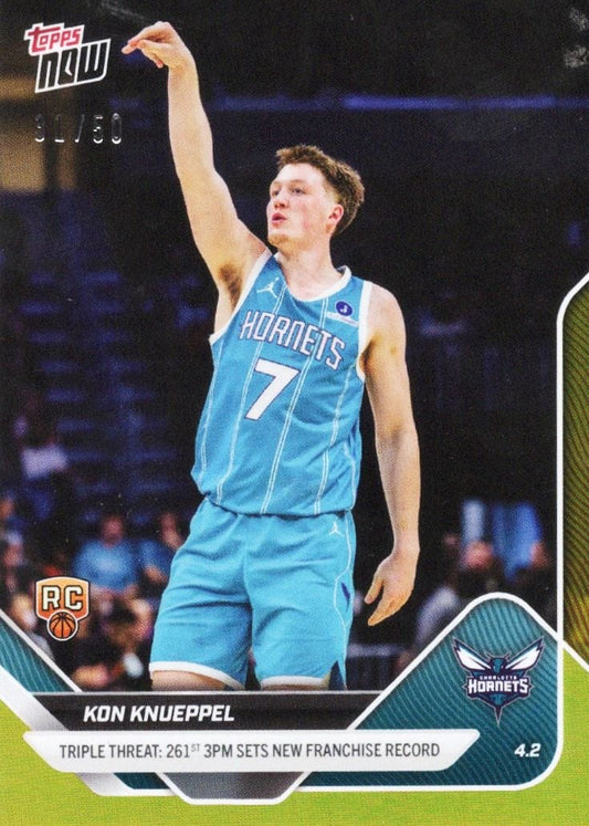 Kon Knueppel wearing Charlotte Hornets light blue jersey number 7, shooting basketball with arm raised, gold foil card with franchise record text.