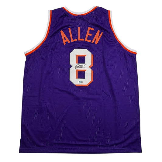 Back view of purple basketball jersey with "ALLEN" and number 8 in orange and white, featuring autographed number patch.