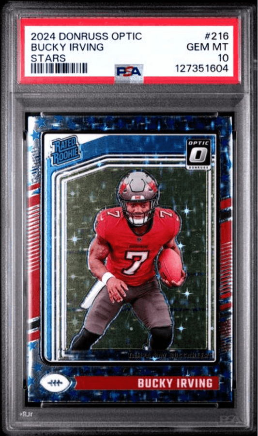 PSA-graded rookie card in clear plastic holder displaying Bucky Irving in red Buccaneers uniform with blue Donruss Optic design and red label.