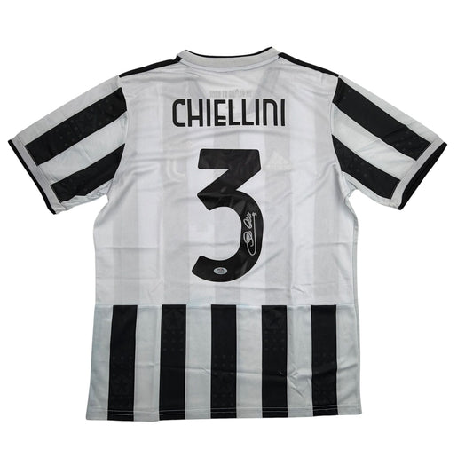 Back view of white and black striped Juventus jersey with "CHIELLINI 3" printed and autographed on number.