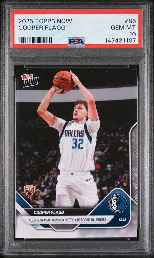 PSA-graded rookie card in clear case displaying Cooper Flagg in Dallas Mavericks white uniform shooting basketball, with red grading label showing GEM MT 10.