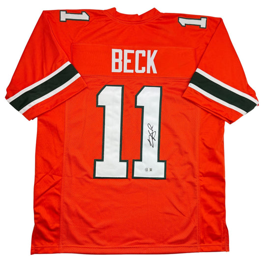 Red college football jersey with "BECK" and number "11" displayed front-center, featuring black and white striping on sleeves and an autograph on the number.