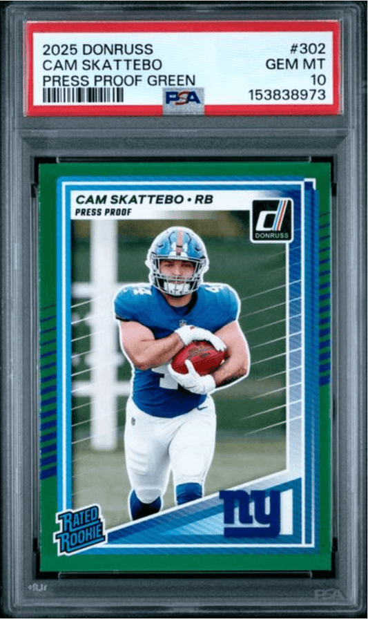 PSA-graded card in plastic holder displaying front of Cam Skattebo rookie card with green press proof border and Giants logo.