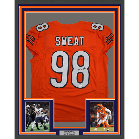 Framed orange Chicago Bears #98 jersey signed by Montez Sweat, displayed with two accompanying photographs and nameplate.