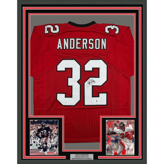 Red Atlanta Falcons jersey #32 with "Anderson" nameplate, signed, displayed in black frame with two action photos and nameplate below.