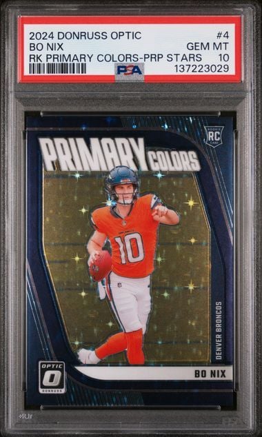 Graded trading card in protective case showing Bo Nix in orange Denver Broncos uniform, displayed front-facing with PSA grading label visible on case edge.