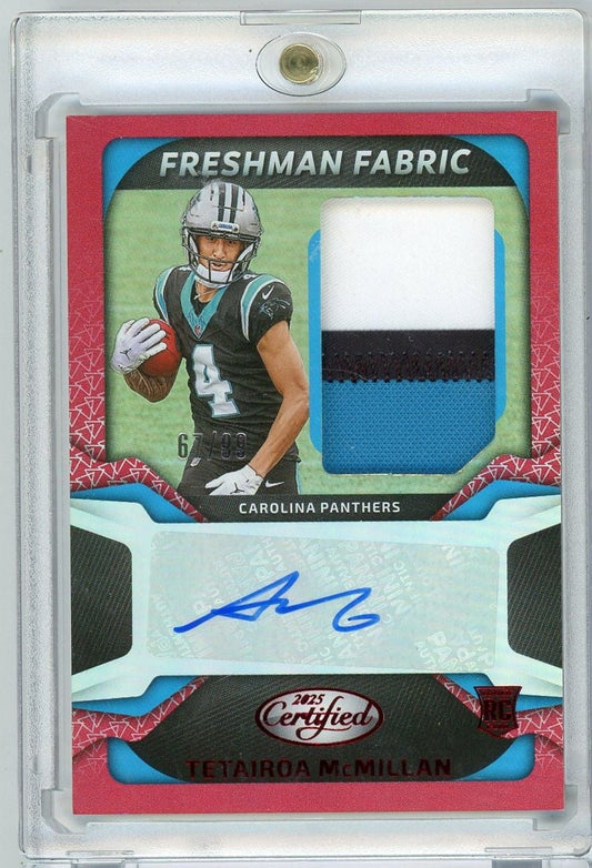 Front view of rookie football card in clear case showing player in Carolina Panthers uniform, red border, fabric swatch window, and blue autograph on white panel.