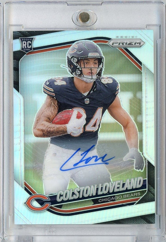 Slabbed 2025 Panini Prizm Colston Loveland rookie card featuring player in Chicago Bears uniform with blue autograph signature.