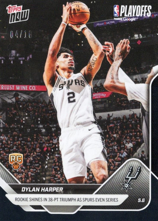 Dylan Harper in white Spurs jersey number 2 shooting a basketball during playoff game, card numbered 04/10 with black foil finish.