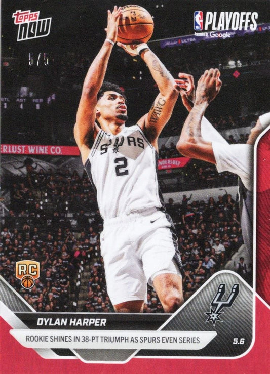 Dylan Harper in white Spurs uniform shooting basketball during playoff game, card shows red foil border and rookie designation.