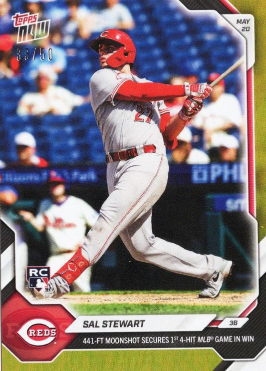 Baseball card showing Sal Stewart in red Cincinnati Reds uniform mid-swing, with gold foil border and game details printed below.