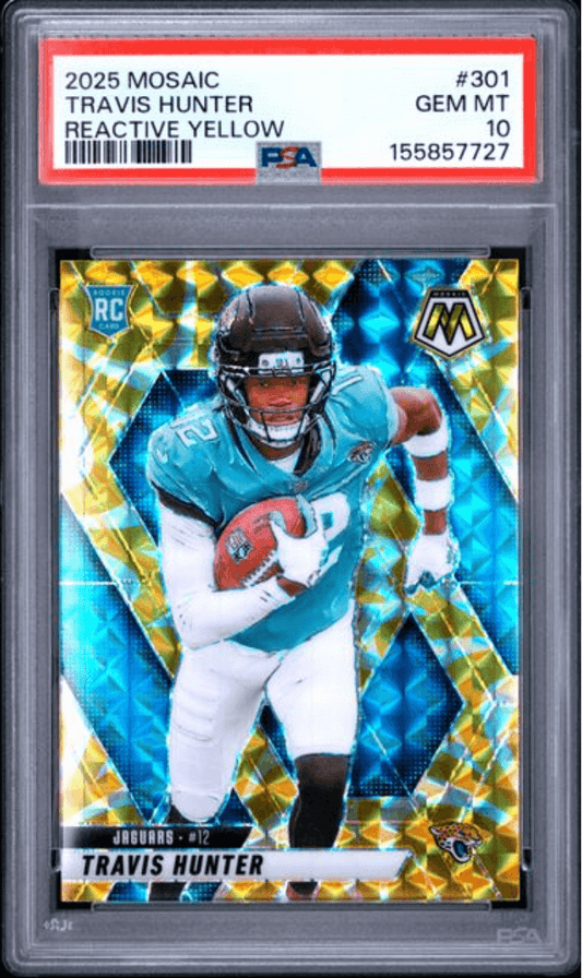 Graded trading card in PSA holder showing Travis Hunter in Jaguars uniform on yellow and blue reactive background with RC badge.