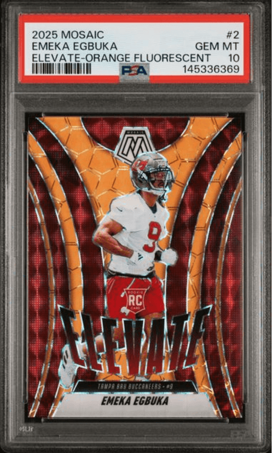 PSA-graded trading card in plastic case showing Emeka Egbuka in white Buccaneers uniform against orange and red geometric background.
