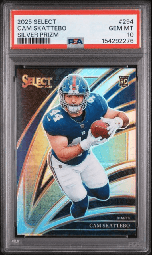 PSA-graded trading card in clear holder displaying Cam Skattebo in blue Giants uniform catching football against gold and blue geometric background.