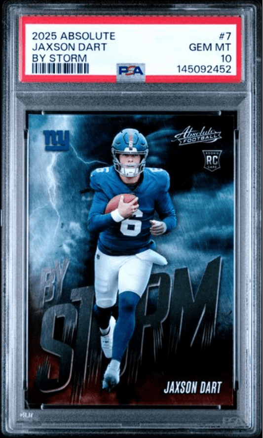PSA-graded rookie card in clear case showing Jaxson Dart in New York Giants uniform running with football against stormy blue background.