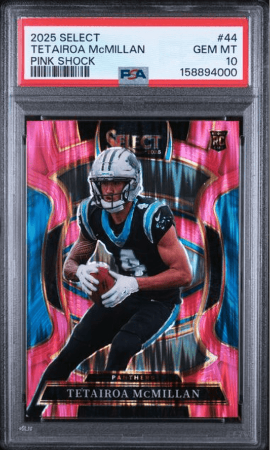 PSA-graded rookie card in clear plastic case showing Tetairoa McMillan in Panthers uniform against vibrant pink and blue shock design background.