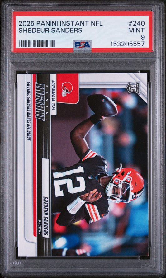 PSA-graded rookie card in plastic holder showing Shedeur Sanders catching football in red uniform, number 240.