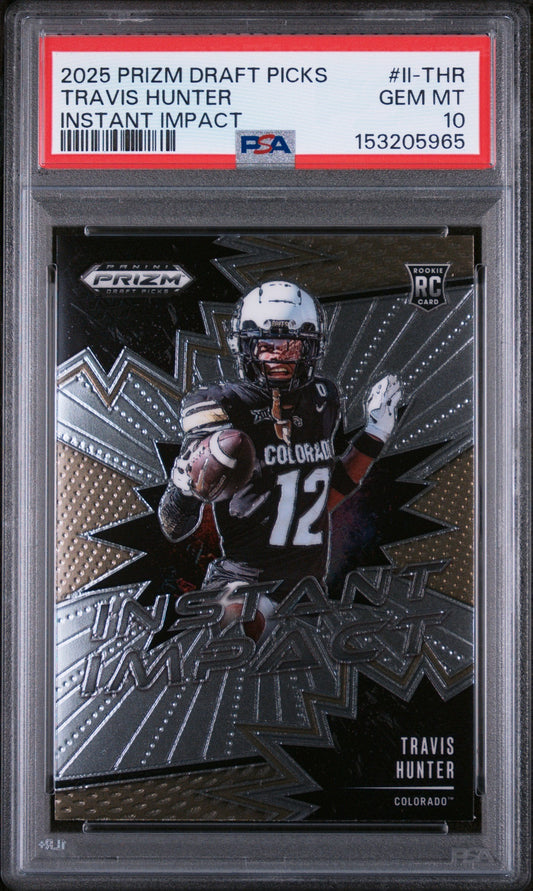 PSA-graded trading card in clear plastic case displaying Travis Hunter in Colorado uniform holding football with "Instant Impact" text and Prizm Draft Picks branding.