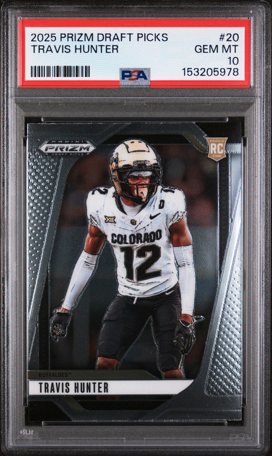 PSA-graded Travis Hunter rookie card in clear protective case showing front with player in white Colorado uniform and red PSA label at top.
