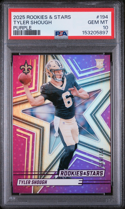 Front view of graded trading card in clear plastic slab showing Tyler Shough in Saints uniform catching football against purple and gold geometric background.