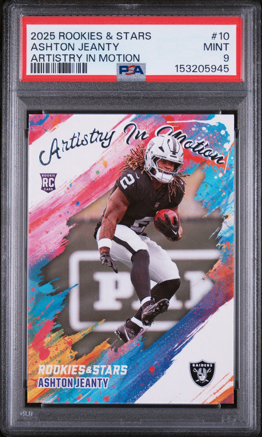 PSA-graded rookie football card in clear plastic case displaying Ashton Jeanty in black Raiders uniform with colorful pink, blue, and orange artistic brushstroke design elements.