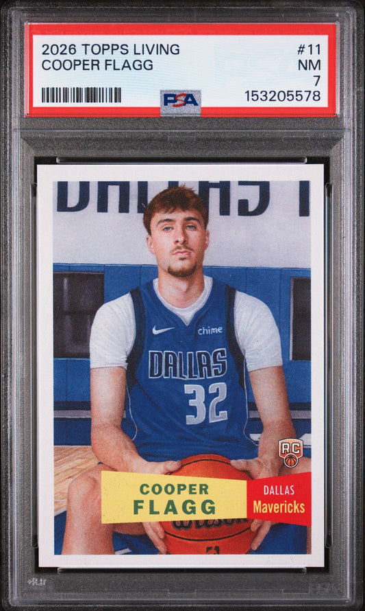 PSA-graded Cooper Flagg rookie card in protective case showing front with player in Dallas Mavericks uniform number 32.